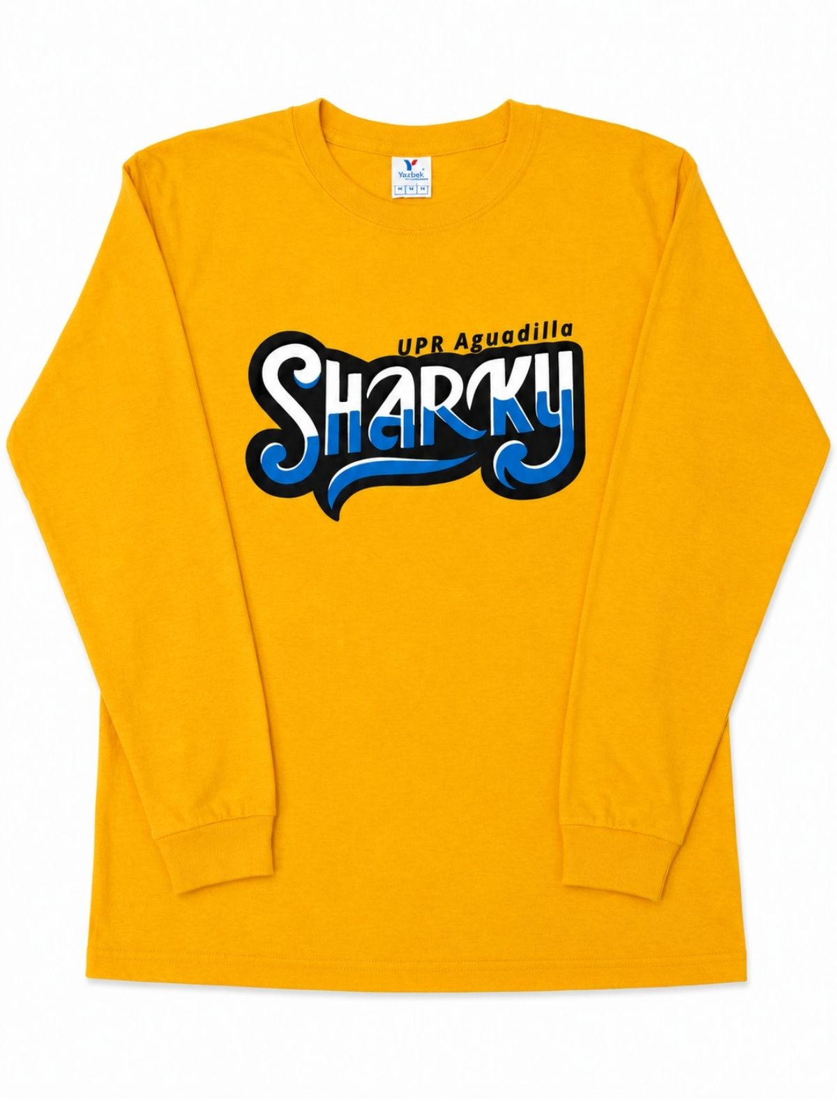 Camisa amarilla manga larga con estampado Sharky UPR Aguadilla, la palabra Sharky en color blanco y azul en fondo negro
